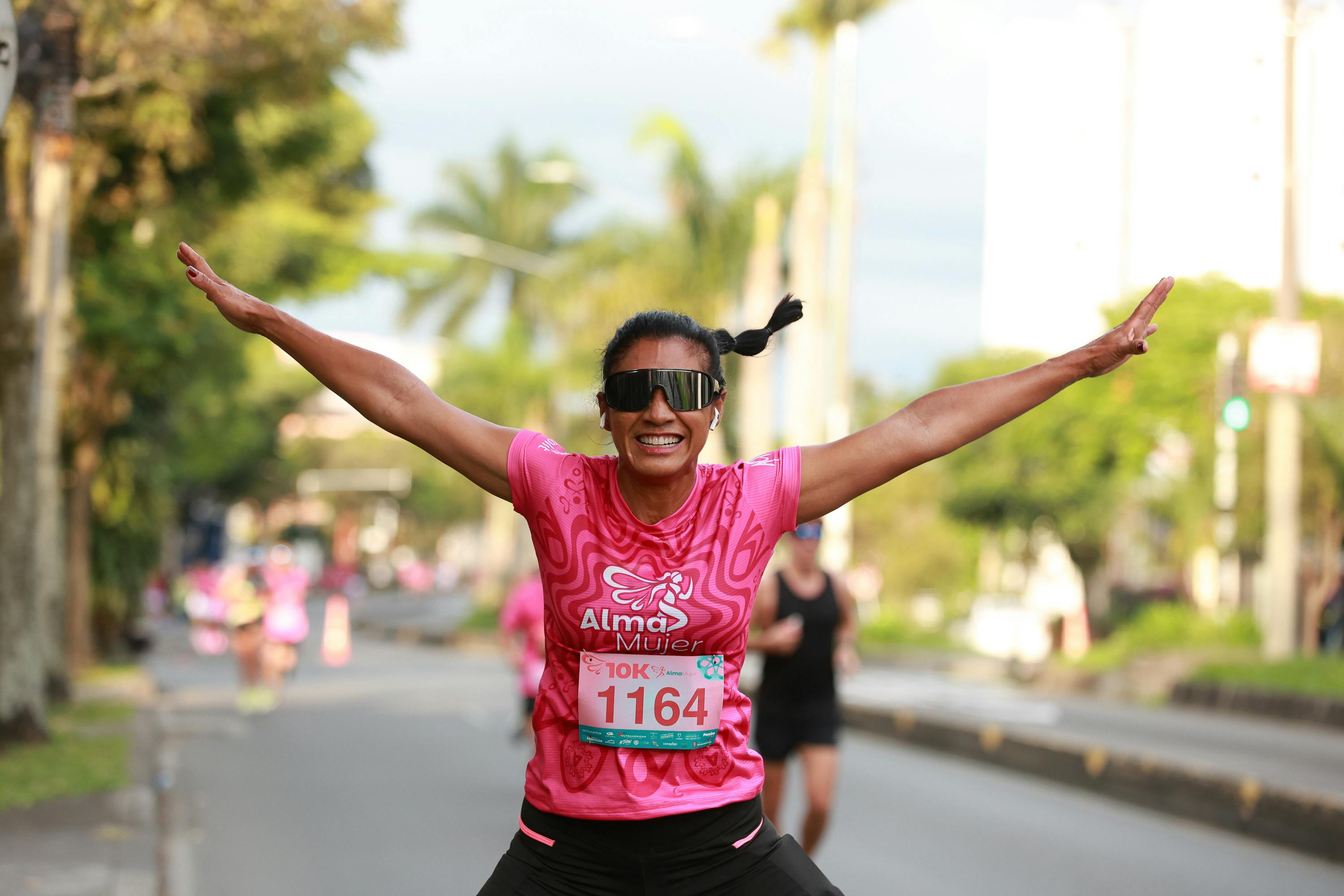 Runner celebrating at the finish line